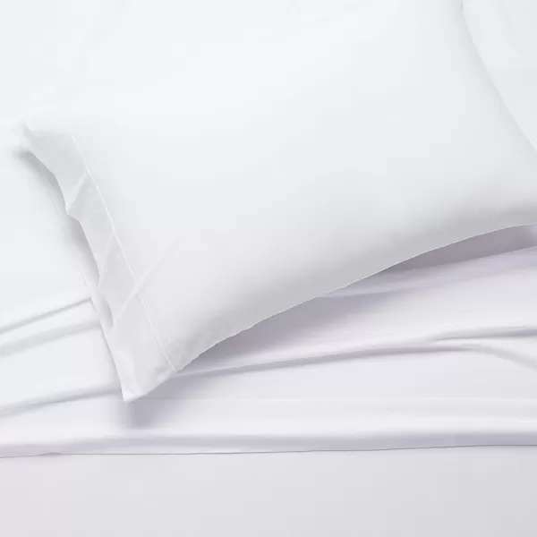 imageAmazon Basics 3 Piece Bed Sheets Set 100 Cotton Jersey Includes Super Soft Flat and Fitted Sheets Pillowcase 28 x 52 Inches Toddler White SolidWhite