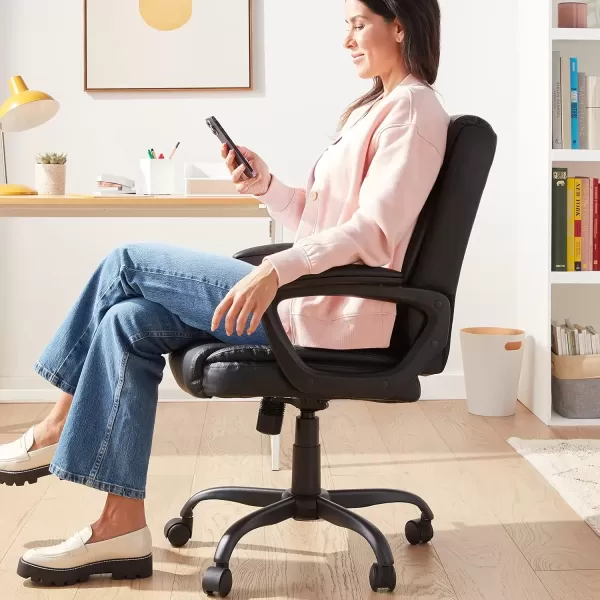 imageAmazon Basics Classic Puresoft PU Padded MidBack Height Adjustable Office Computer Desk Chair with Armrest 26quotD x 2375quotW x 42quotH BlackBlack