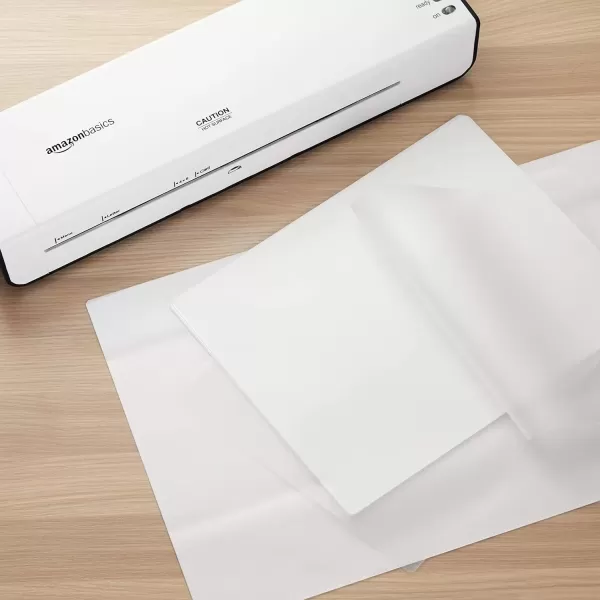 imageAmazon Basics Clear Thermal Laminating Plastic Paper Laminator Sheets 9 x 115Inch 50Pack 3mil50Pack