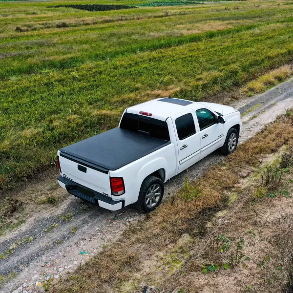 imageAmazon Basics Soft RollUp Truck Bed Tonneau Cover for 20142019 Chevy Silverado GMC Sierra 1500 20152018 Silverado Sierra 2500 3500 HD Fleetside Bed Length 65Bed Length 65