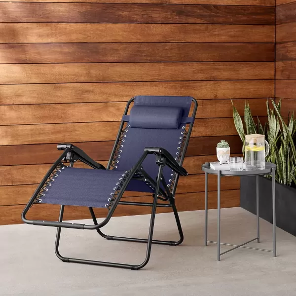 imageAmazon Basics Outdoor Textilene Adjustable Zero Gravity Folding Reclining Lounge Chair with Pillow 26quot Navy BlueNavy Blue