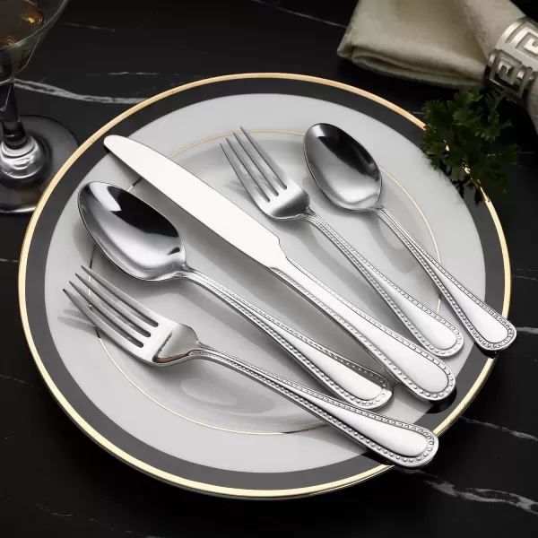 imageAmazon Basics Silverware Set Stainless Steel Flatware 20Piece Forks and Spoons Service for 4 Round Edge20Piece