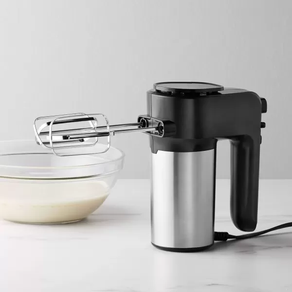 imageAmazon Basics 6Speed Electric Hand Mixer with Dough Hooks Beaters and Turbo Button 629 quart BlackampampStainless steel