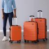 imageAmazon Basics 30Inch Hardside Checked Luggage Hardshell Suitcase With Wheels Expandable For Up to 15 More Space With ScratchResistant Surface Four Multidirectional Wheels Rose GoldOrange