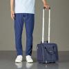 imageAmazon Basics Underseat Carry On Luggage with Wheels  14Inch Rolling Travel Bag BlackNavy
