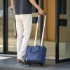 imageAmazon Basics Underseat Carry On Luggage with Wheels  14Inch Rolling Travel Bag BlackNavy Blue