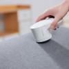 imageAmazon Basics Battery Operated Fabric Shaver Lint and Fuzz Remover with 2 Spare Blades  White