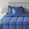 imageAmazon Basics Twin XL Comforter Set with Sheets 5Piece Blue Calvin Striped Bedding Lightweight Microfiber BedinaBagBlue Calvin Striped
