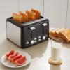 imageAmazon Basics 4 Slice Toaster With 7 Browning Settings Extra Wide Slots For Bagels and Special Breads Removable EasytoClean Crumb Trays CancelDefrostBagel Buttons 1500W Black ampamp Silver4 Slice