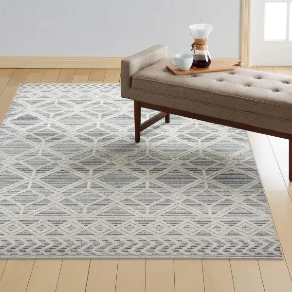 Brookstone Aurora Bohemian Geometric IndoorOutdoor High Performance Area Rug BeigeIvory 710x102BeigeIvory